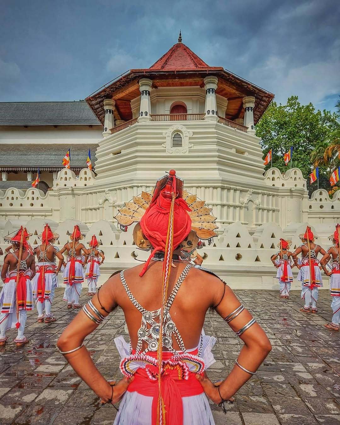 kandyan dancers infront of the Sri Dalada Maligawa also known as temple of tooth relic